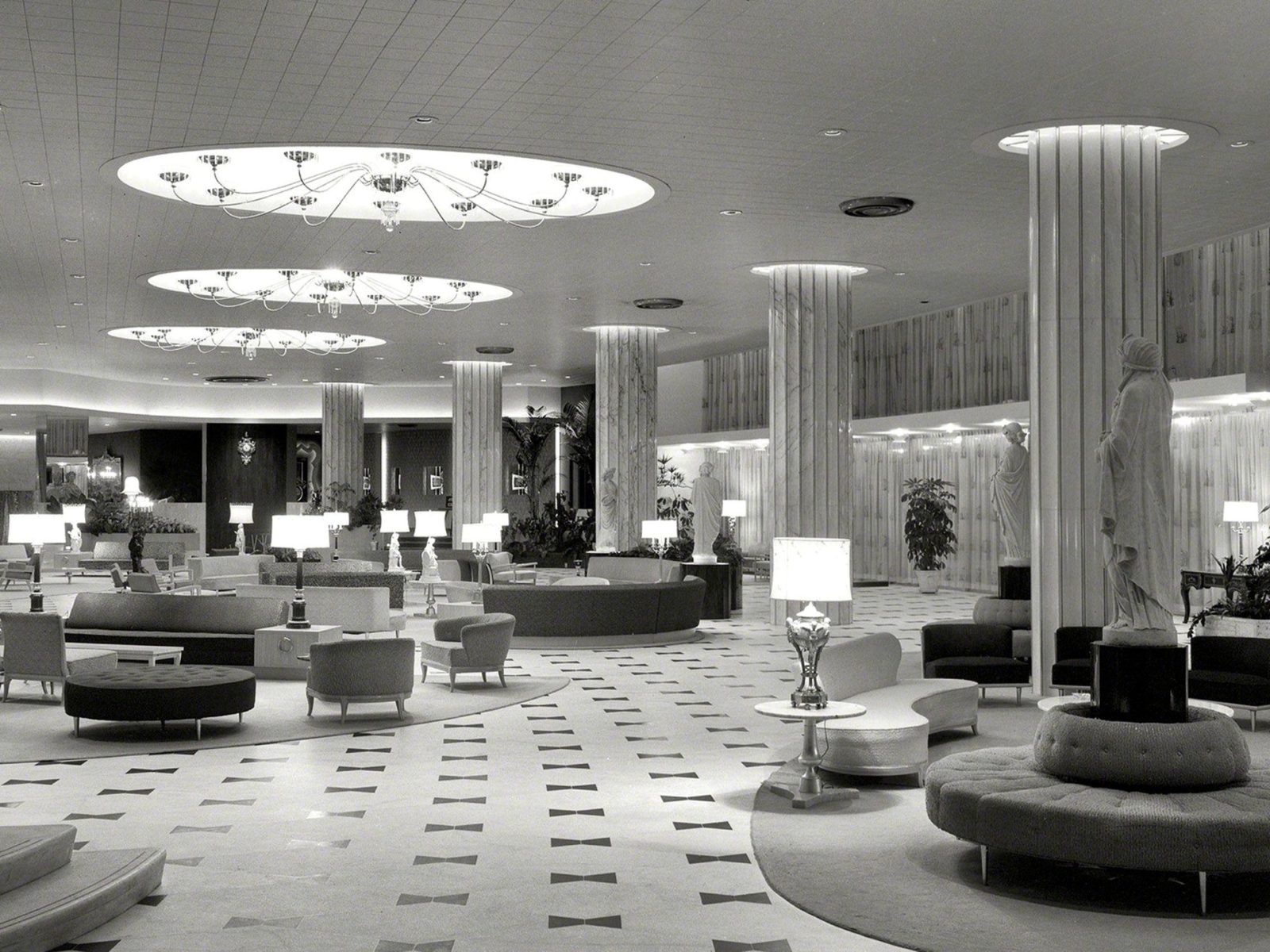 the lobby of the fontainebleau hotel in miami beach, black and white